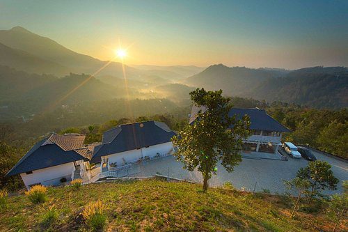 Beautiful hilltop resort in Kerala with scenic views and lush greenery. Perfect for relaxing Kerala.